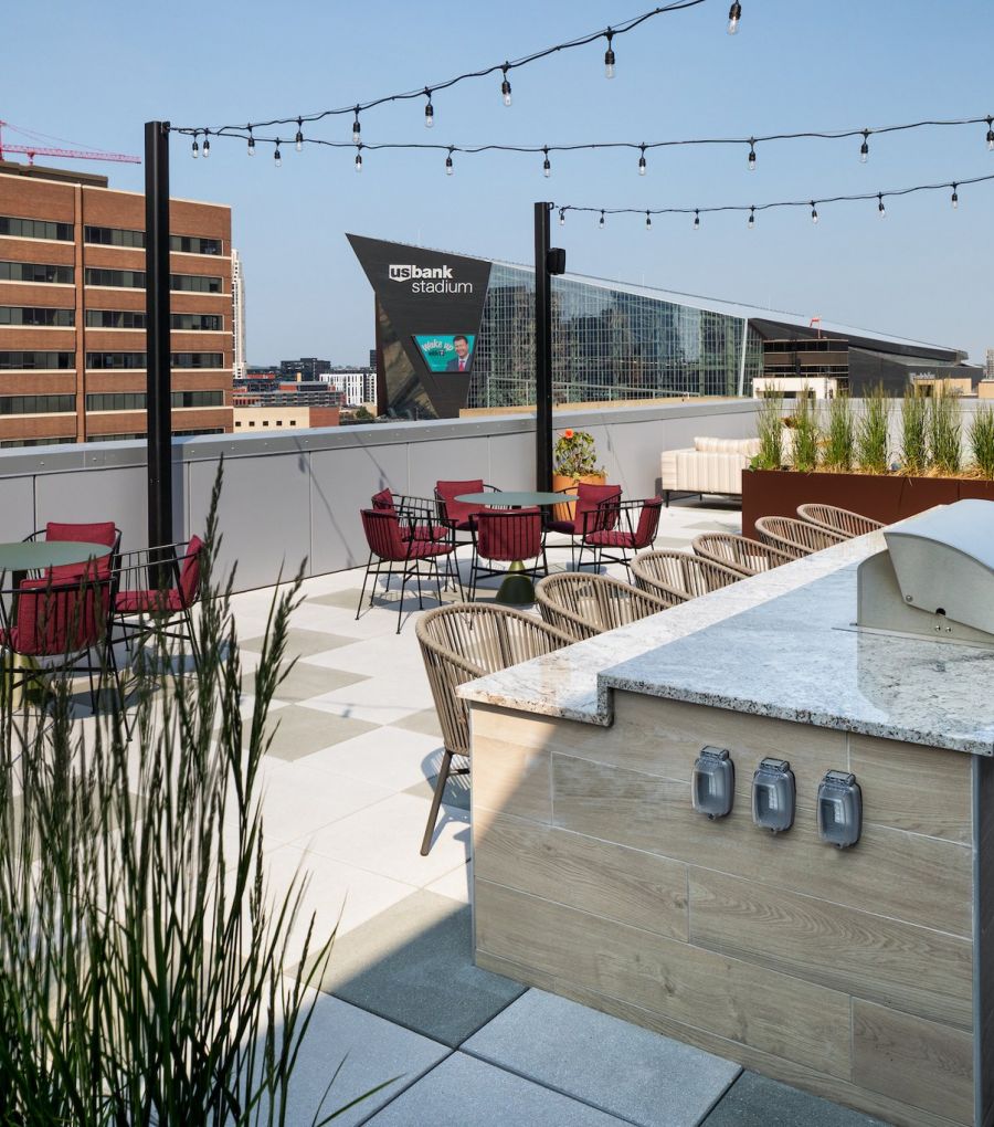 rooftop terrace amenity at Moment Apartments with views of downtown Minneapolis